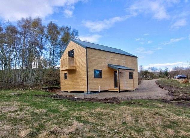 The £200,000 eco-home (exterior pictured) was constructed on the banks of Loch Migdale in Sutherland, Scotland