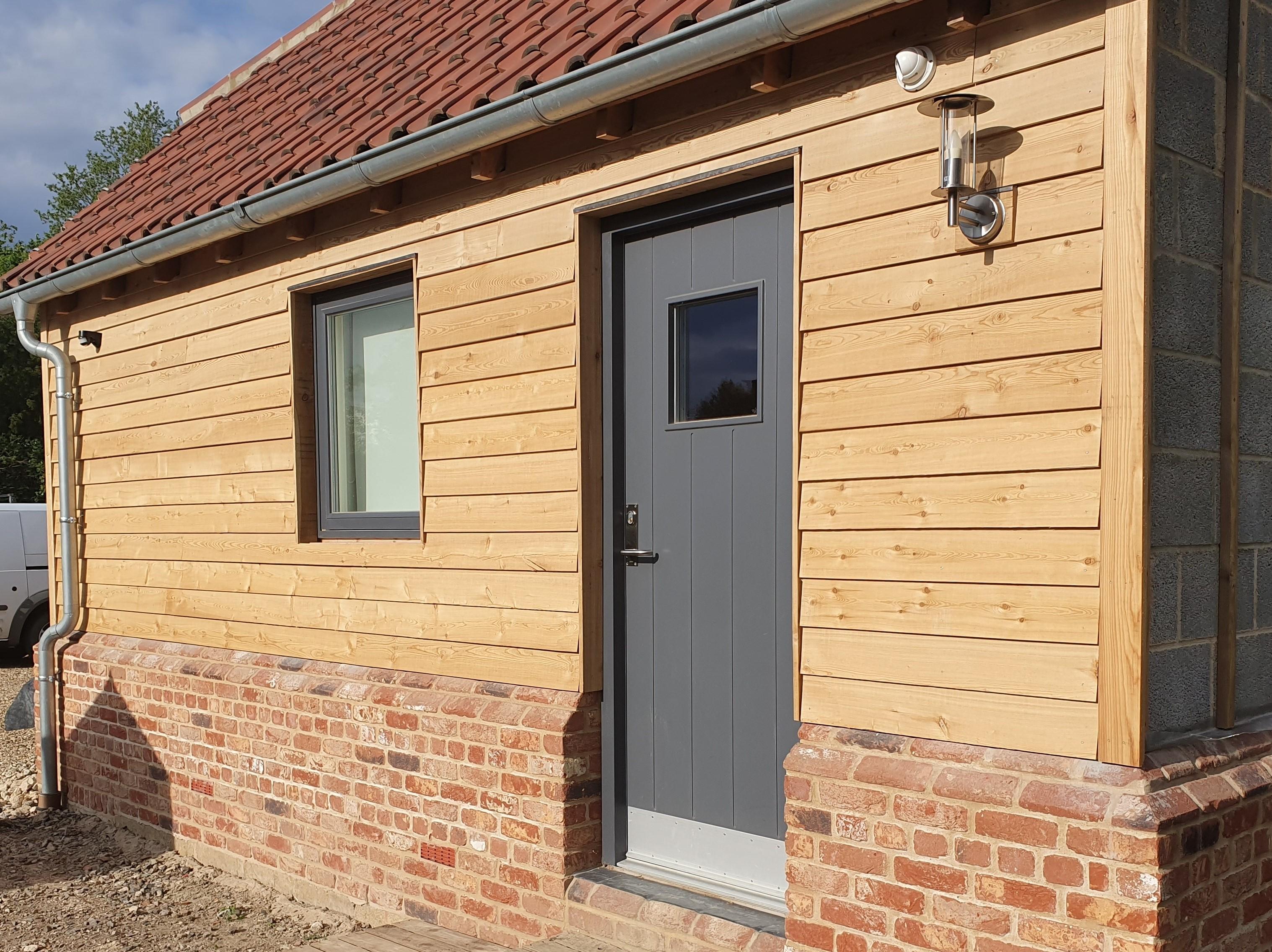 experiences with larch and cedar cladding - general