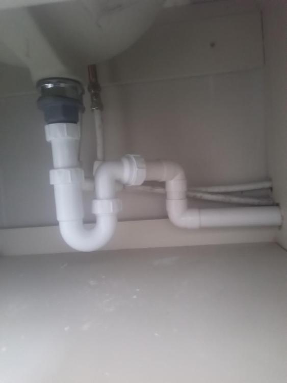 waste pipes under sink.jpg