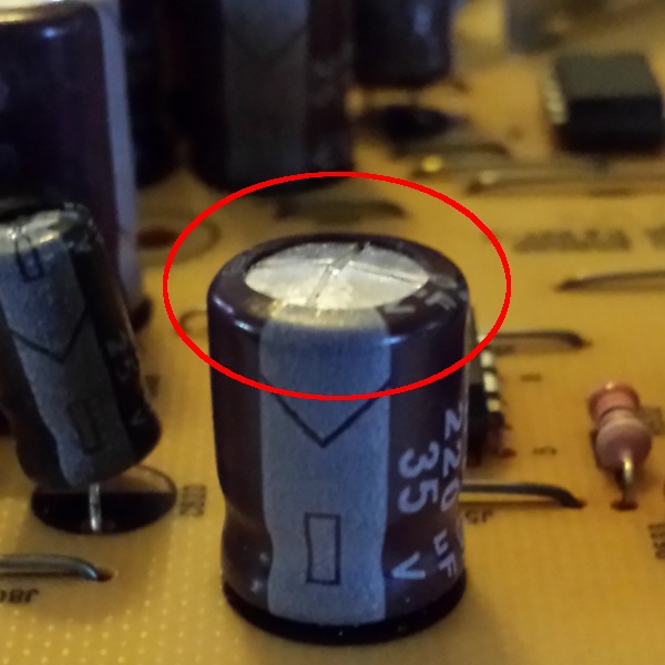 bulged_capacitor.jpg.a25cc6a2b0d13a62d8d11938d562ee33.jpg