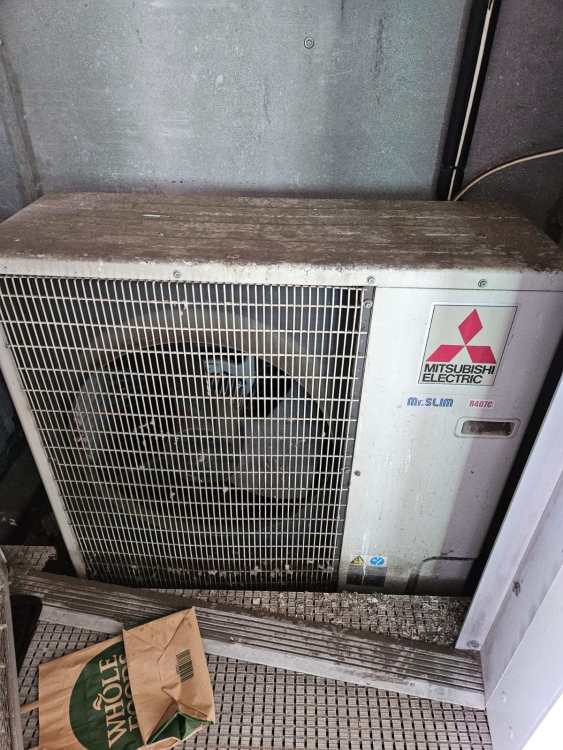 air con ext unit.jpeg