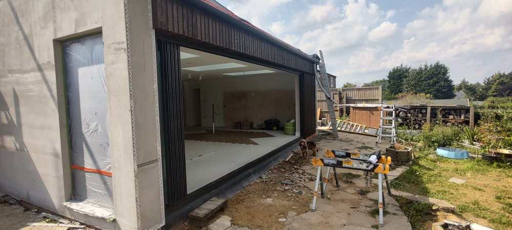 Cladding Install Dog Inspection.jpg